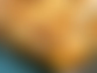 Freshly baked hot cross buns glazed with orange syrup on a baking tray