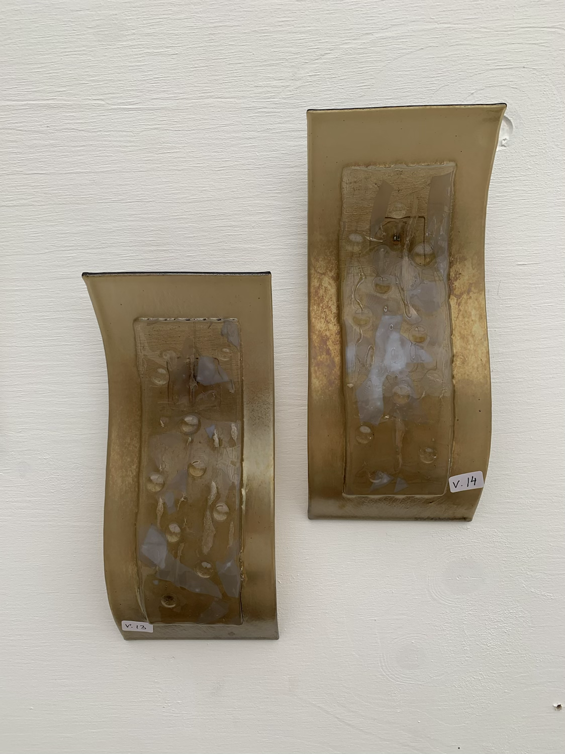 Väggtavla bronsfärgad i våg