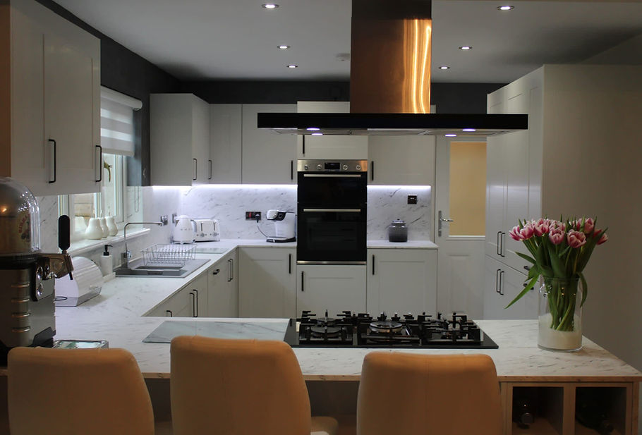 White kitchen with black handles