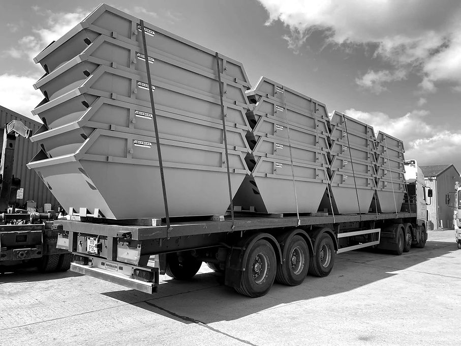 Stacked skips on lorry