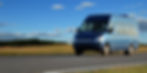 Blue van on the road