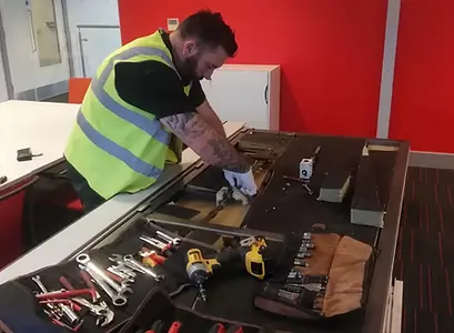 Engineer from AM Walls Ltd with his tool kit ready