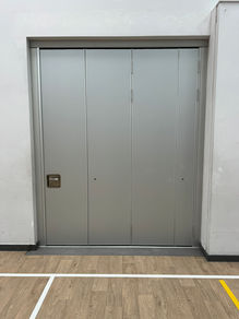ASF100 sliding-folding wall system in gym hall