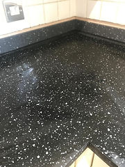 black worktop with white speckle design