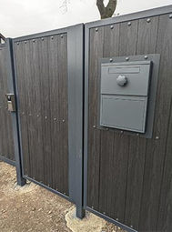 Decorative letterbox on a composite gate