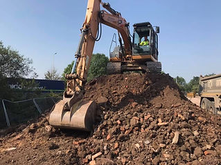 Site being cleared by digger