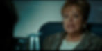 Kathy Bates as Madam Secretary, wearing a pants suit and a lot of pearl jewelry.