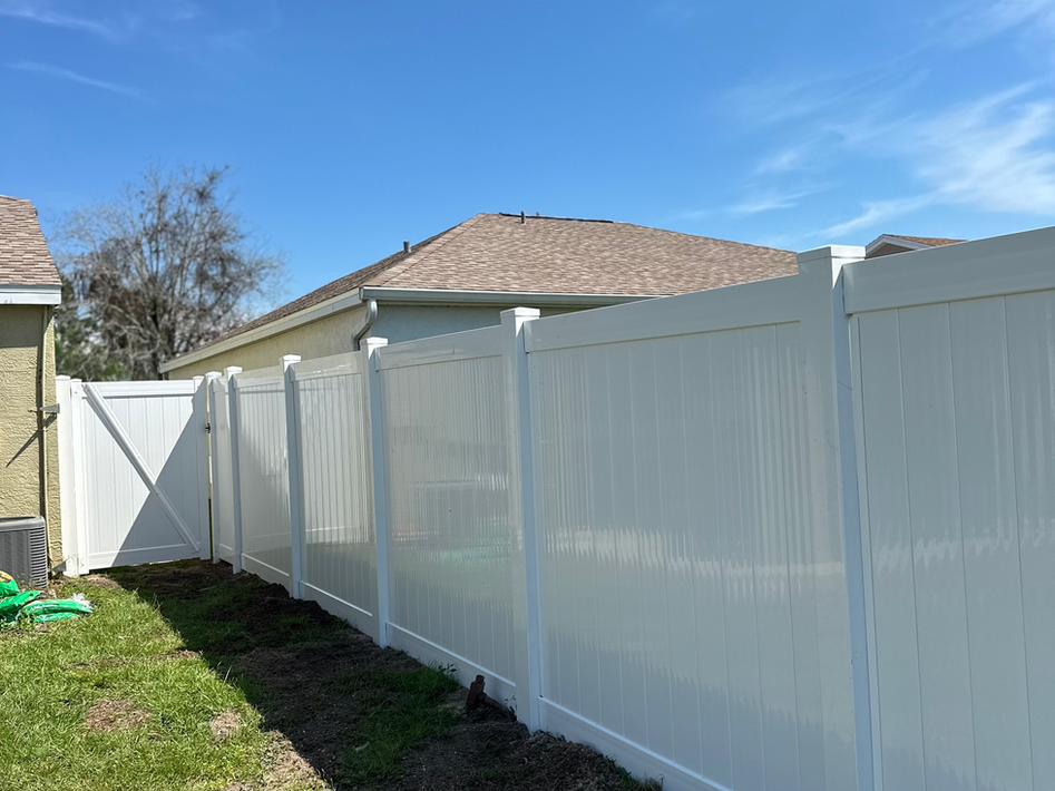 White vinyl fence with a clean finish.