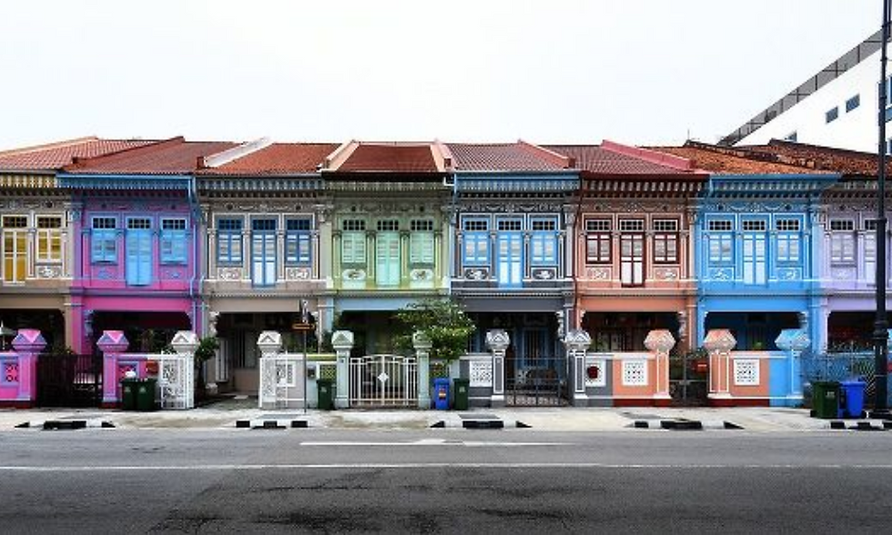 Row of colorful shophouses in Katong. PropNex Shophouse Elites.