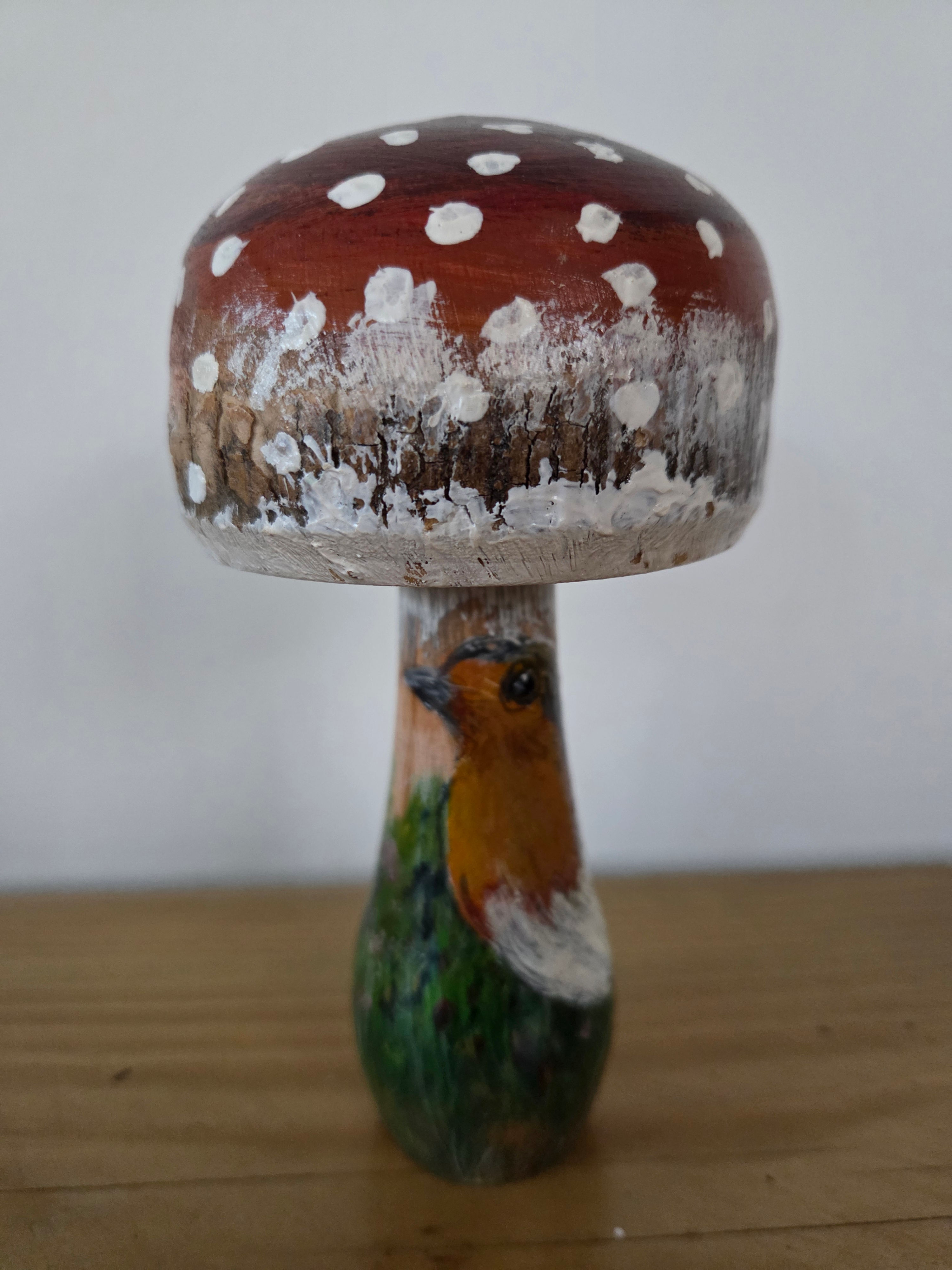 Small wooden mushroom robin