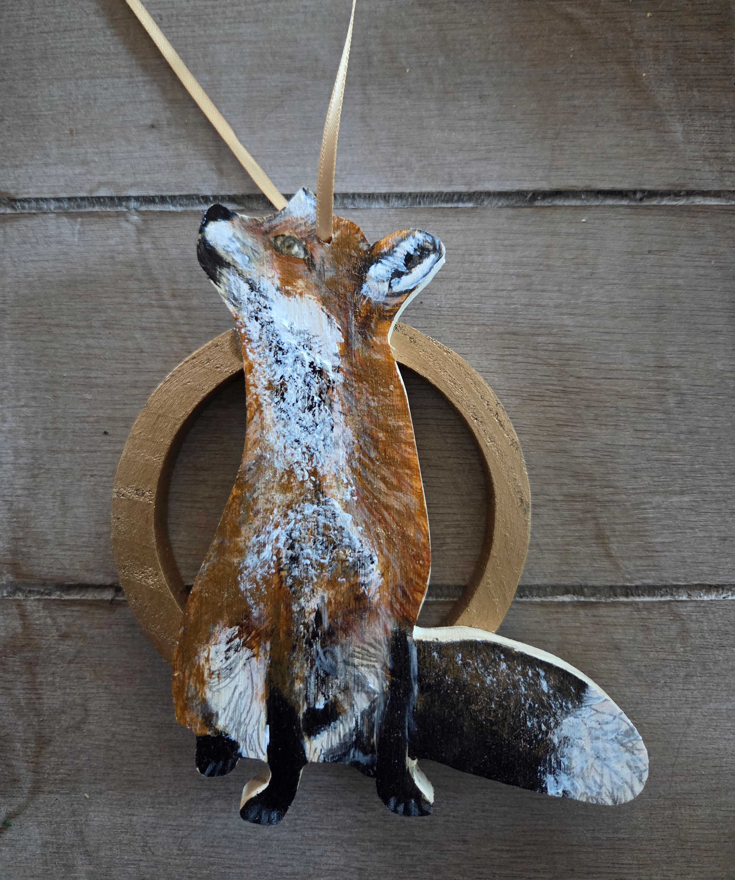 Hand crafted and hand-painted wooden decoration Fox