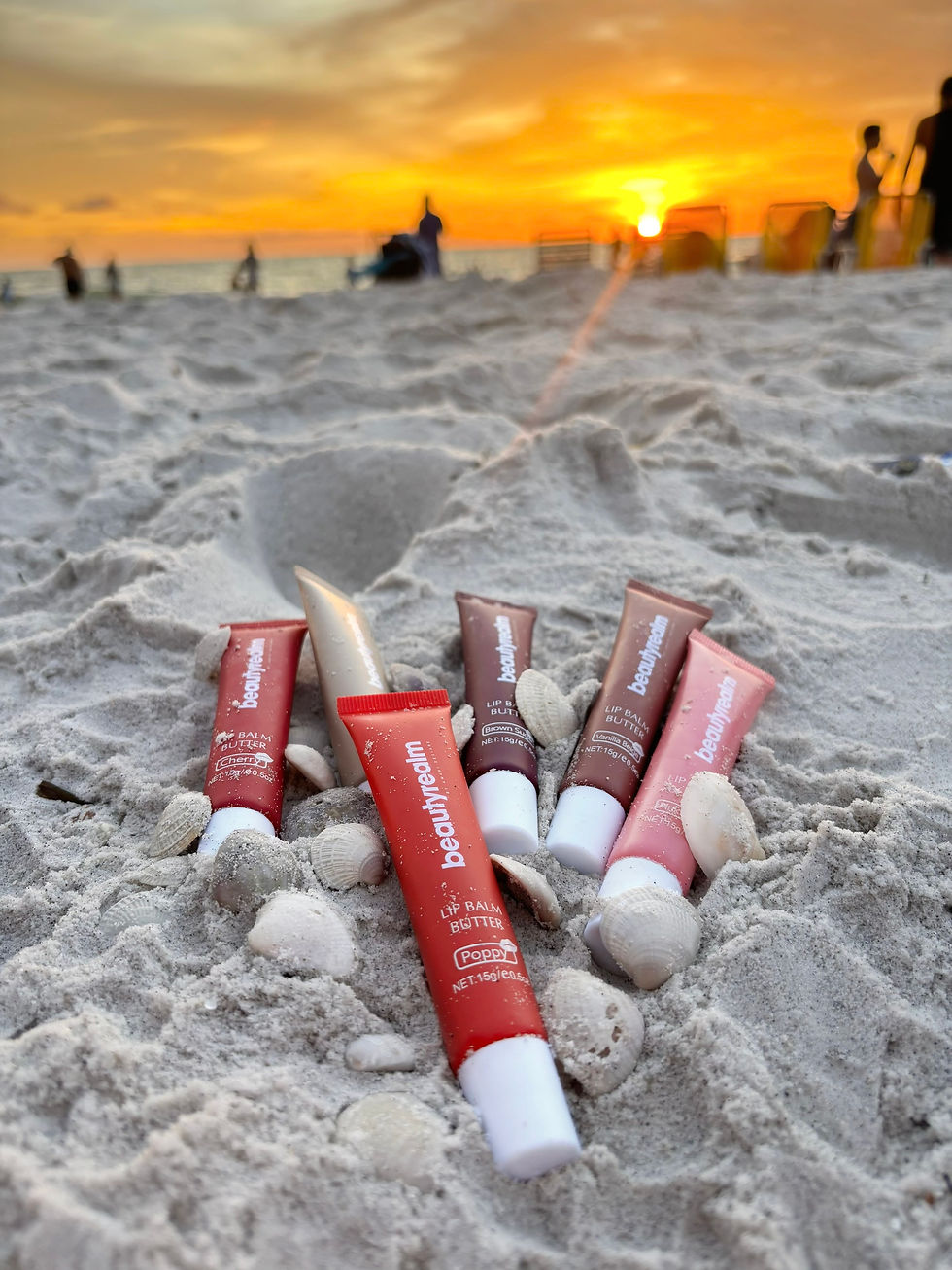 Thumbnail: lip products at beach sand