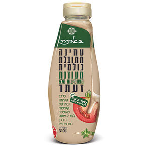 "בארכה" משיקה טחינה גולמית משומשום מלא, מתובלת בזעתר, בבקבוק לחיץ