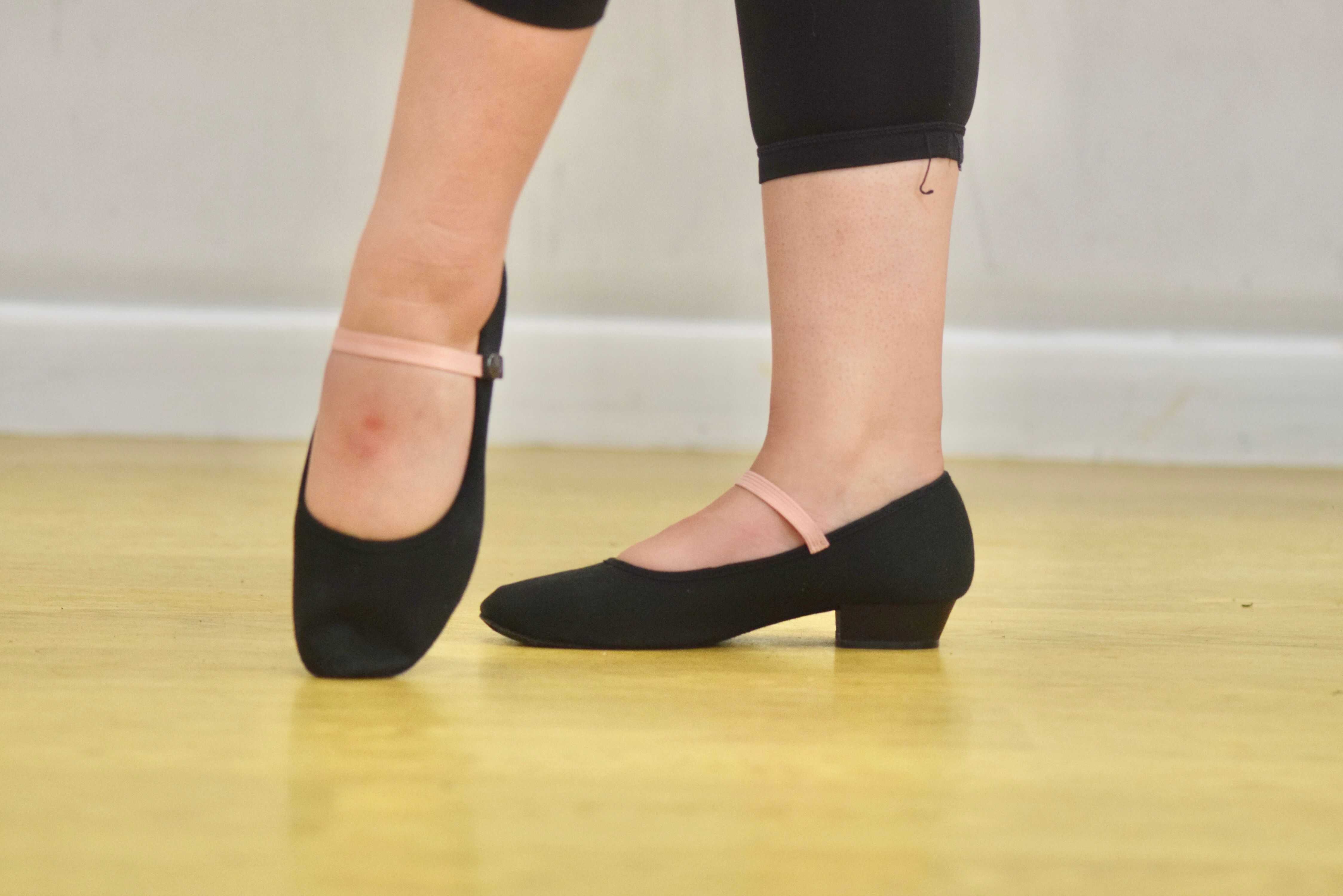 Black canvas low heel character shoes