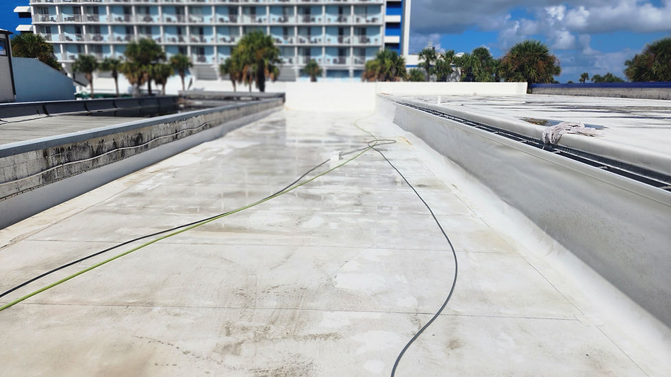 COMMERCIAL TPO ROOF BEING SOFTWASHED BY CLEAN 2 PRESERVE