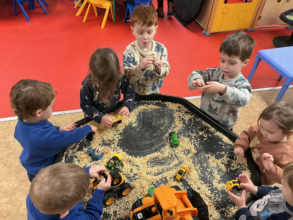 Kids playing with toy cars and trucks