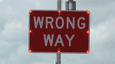 wrong-way-sign-motion.gif