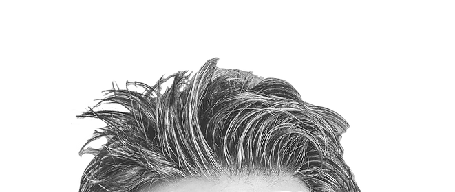 black and white top of man head with spikey hair