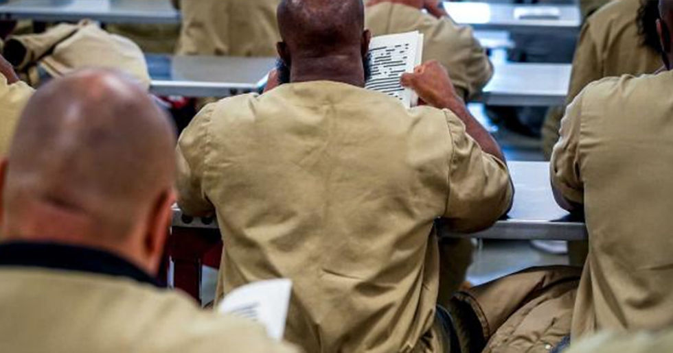 Man unlearning gender roles and reflecting on feminist lessons in prison.