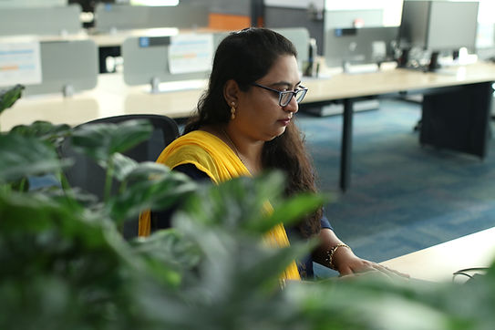 Female employee working at desk