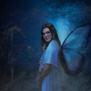 Composited Blue Fairy Photograph created using photoshop with multiple images captured in studio.