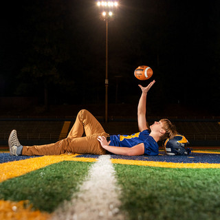 varsity football senior portrait session for nevada union high school in Grass Valley, CA