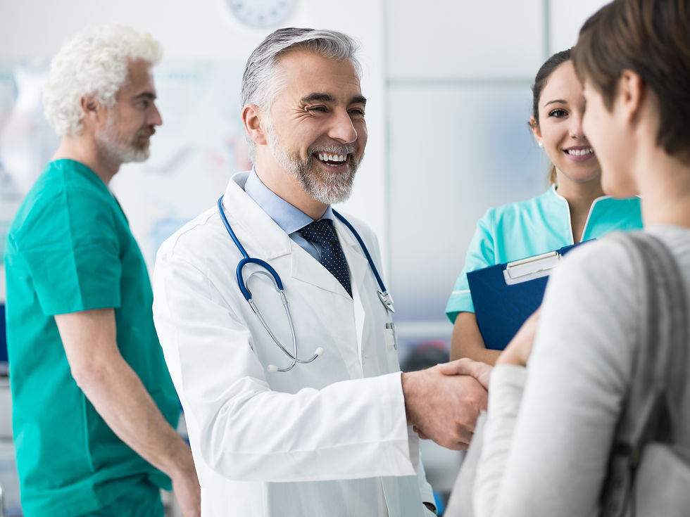 confident-doctor-shaking-patient-s-hand-2024-10-11-00-34-04-utc.jpg