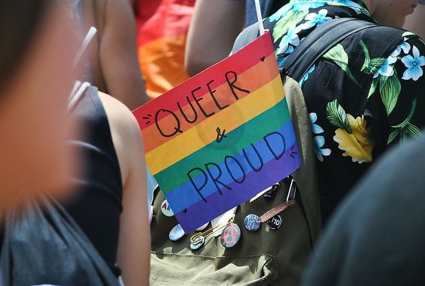 A close-up of a pride flag that reads "queer and proud." Teen counseling in Silverthorne, CO serves as a safe place for LGBTQ+ teens. Contact a teenage therapist in Silverthorne, CO for more info on how teen counseling in Summit County, CO can support you.