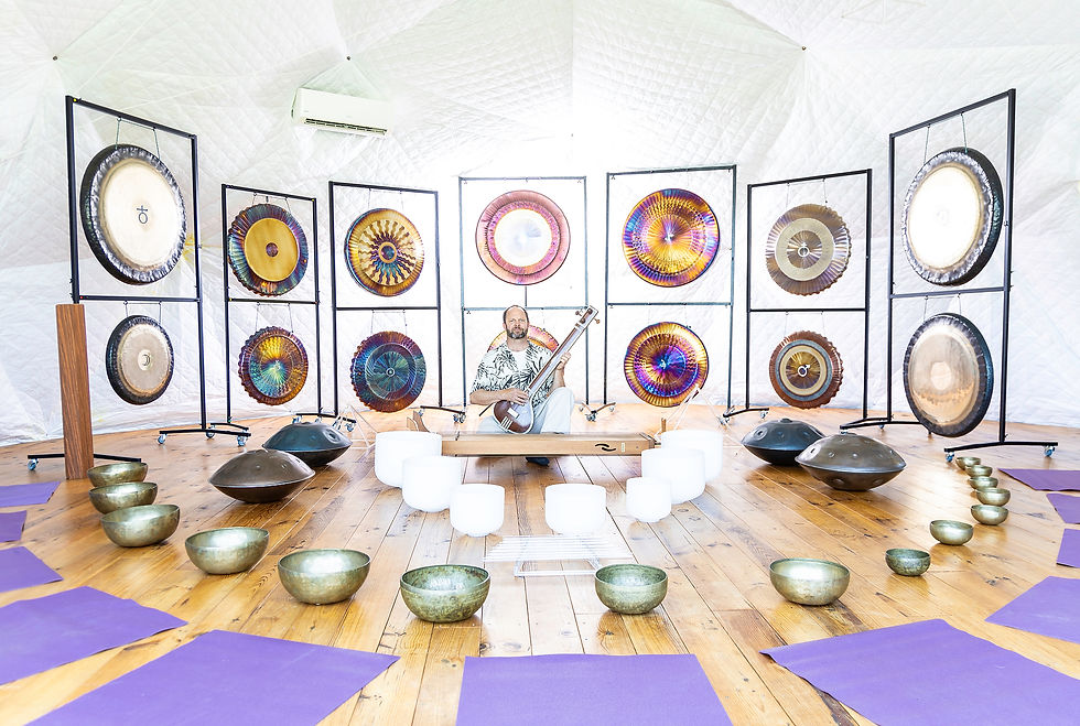 Frank in the centre of his sound world, surrounded by 14 gongs, singing bowls and many other instruments used during the 5-day Sound Healing Training in Portugal.