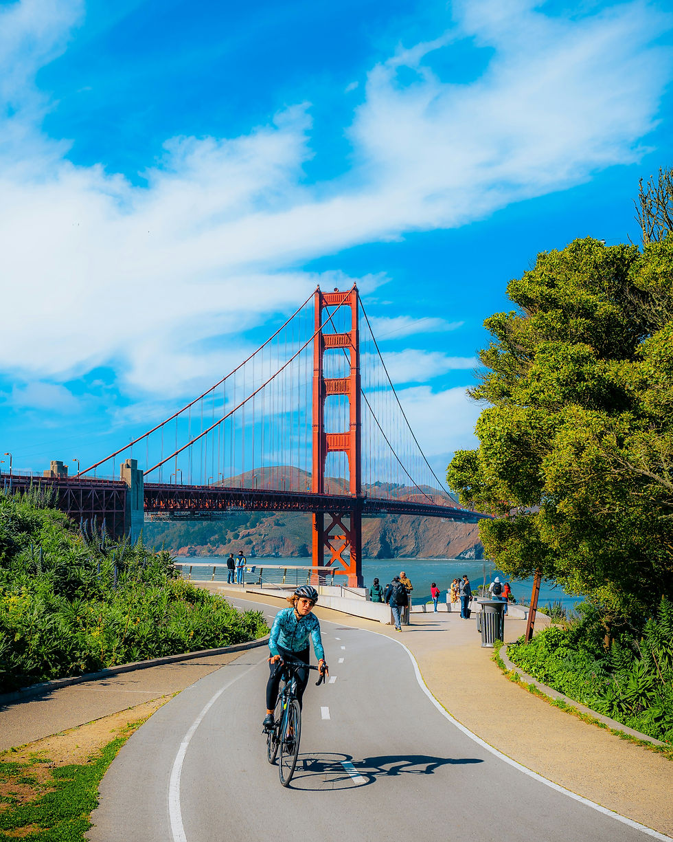 Adventurous cyclists enjoying scenic trails near the iconic Golden Gate Bridge in San Francisco