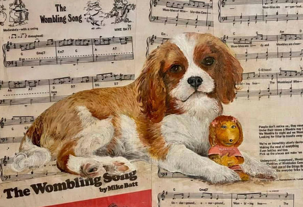Blenheim cavalier with her favourite toy