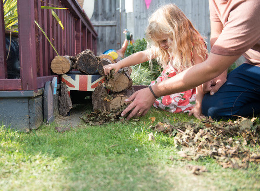 Olive builds a hedgehog house with her Dad Lee Connelly