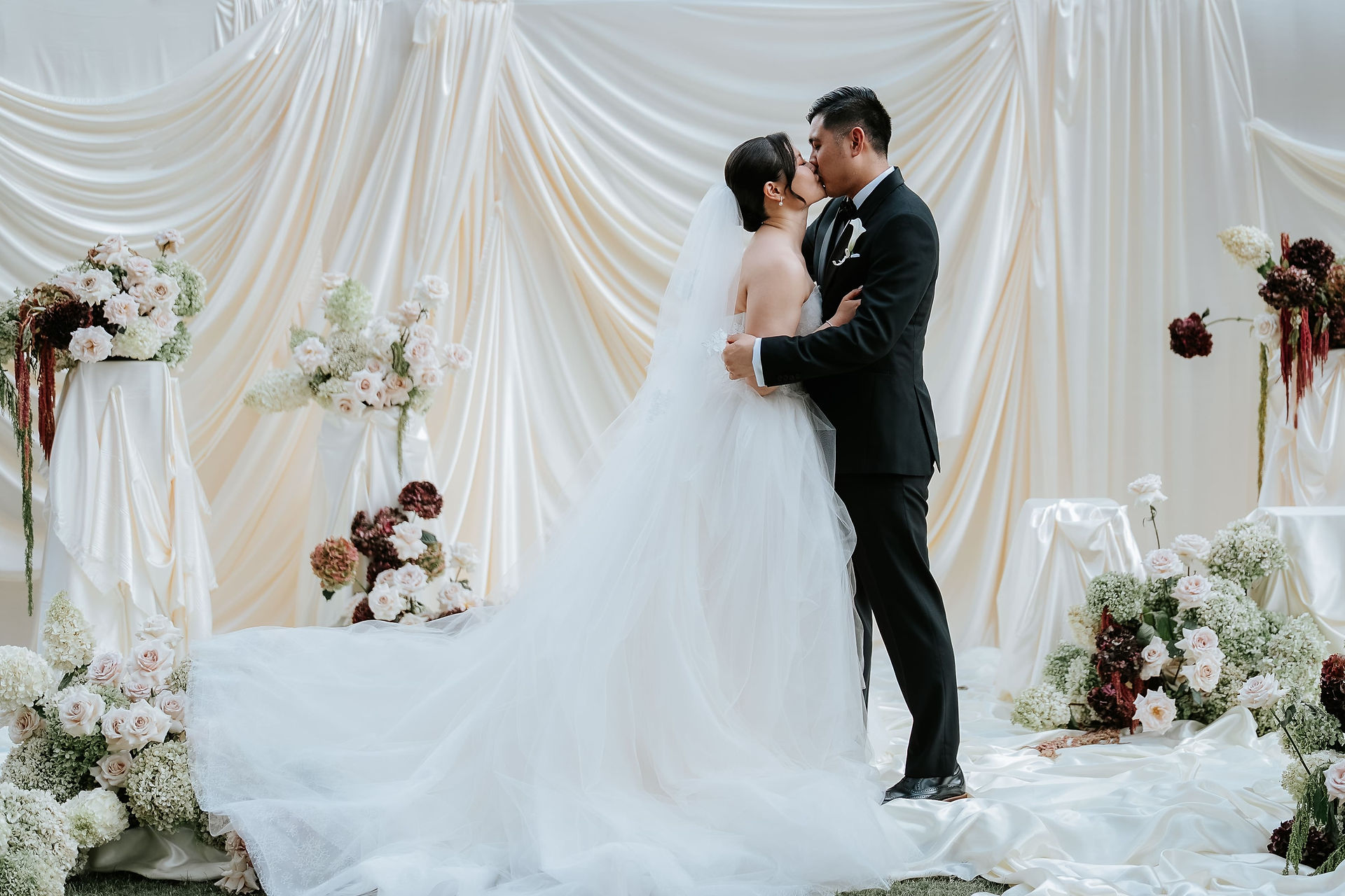 wedding decor ceremony setup with floral accents at the base