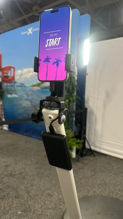 JourneyTeam branded photo booth capture showing a guest posing during a corporate event