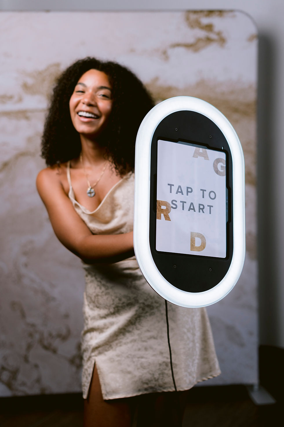 The Mingler — Rocky Mountain Photo Booth's new roaming photo booth, a handheld camera-and-ring-light rig that brings the photo experience to guests at weddings, corporate events, and galas across Utah.
