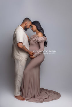 Timeless maternity photo with soft beige backdrop