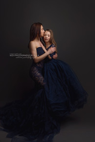 Elegant black-and-white portrait of mum with newborn in Wolverhampton studio