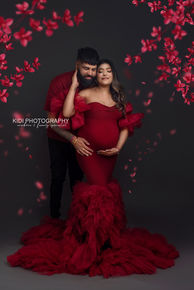 Emotional maternity session capturing motherhood in a calm studio