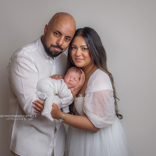 Newborn boy photography Wolverhampton in creamy neutral setup, artistic and timeless baby portrait