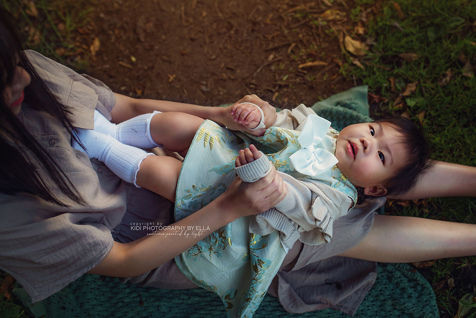 Baby sitting on blanket in meadow – outdoor children’s photography Wolverhampton