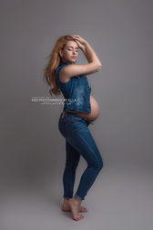 Pregnancy photoshoot capturing a glowing expecting mother.