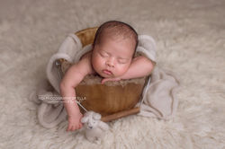 newborn photographer Wolverhampton - sleeping baby in a bucket