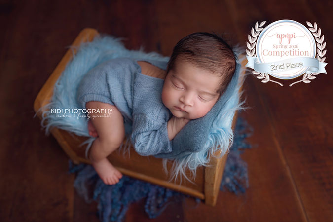 International award-winning newborn photographer in Wolverhampton creating timeless fine art baby portraits