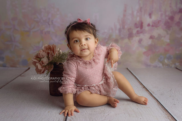 Sitter photography image capturing curiosity and gentle interaction.