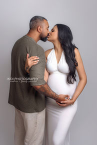 Fine art pregnancy portrait with soft light and elegant posing