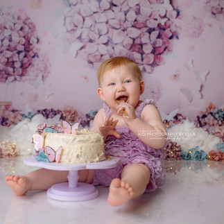 Baby girl in pastel pink setup – cake smash photographer Walsall