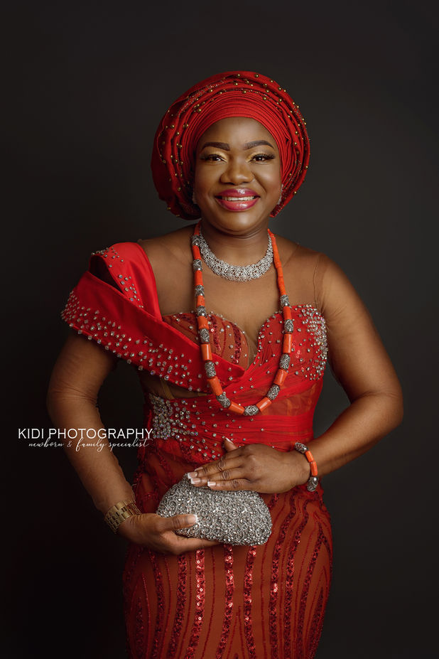 Artistic black and white portrait of a woman celebrating confidence and femininity.