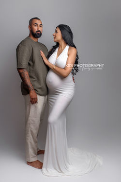 Expecting mother in luxury studio portrait