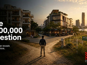Investor weighing how to deploy a $500,000 position across Phnom Penh real estate options at a planning desk.