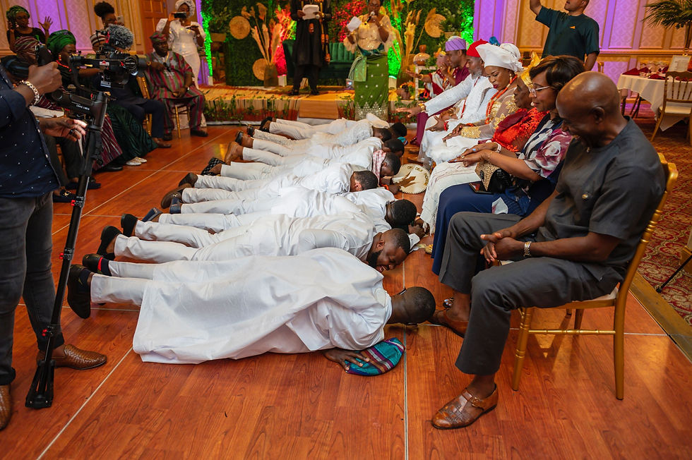 Groom and Groomsmen prostrating before the Bride's Family - Yoruba (Nigerian Wedding - NJ)